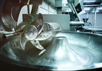 cutter or Mincer for meat processing in the food industry for meat plant.