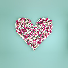 Heart shape from colorful spheres 3D render