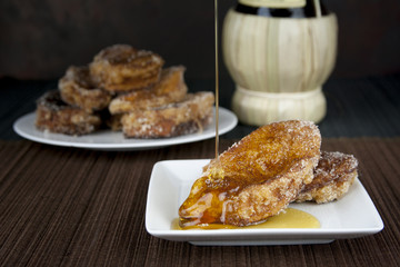 Traditional Spanish torrijas french toast with honey