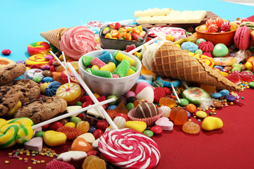 candies with jelly and sugar. colorful array of different childs sweets and treats