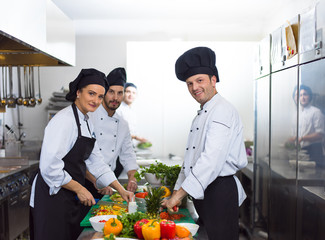 team cooks and chefs preparing meals