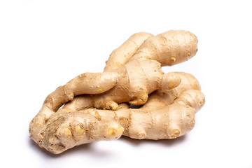 Fresh big ginger root close up copy space isolated on white background