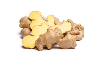 Fresh big ginger root close up copy space isolated on white background