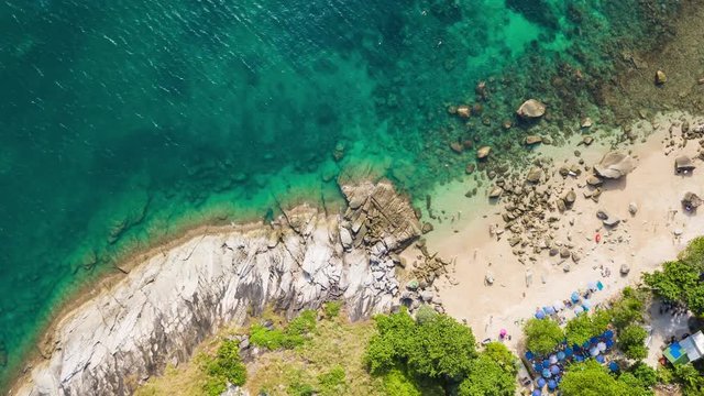 summer day phuket island beach rocks blue water aerial down view 4k timelapse thailand
