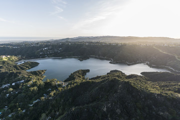 Fototapeta na wymiar Aerial view of Stone Canyon Reservoir and the Santa Monica Mountains in Los Angeles, California.