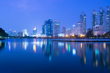 Fototapeta na wymiar Bangkok business district at night view from Benjakitti Park.