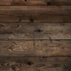 Fototapeta premium Old wood plank wall background dark weathered distressed faded pine grain wooden texture surface photo square format