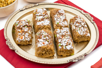 Indian Sweet Food Gulab Halwa isolated on White Background