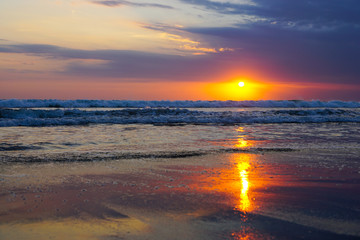 Fototapeta na wymiar Sunset on Seminyak Beach in Bali