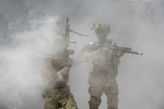 Soldiers with smoke on a wallpaper