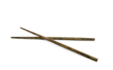 Wooden chopsticks on white background.