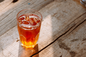 southern style iced sweet tea in two glasses rustic wooden table