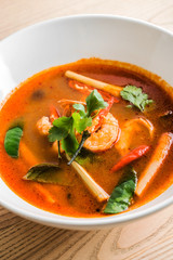 Tom Yam Kung ,thai food in wooden bowl