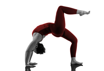 Woman In Urdhva Dhanurasana Yoga Pose on white