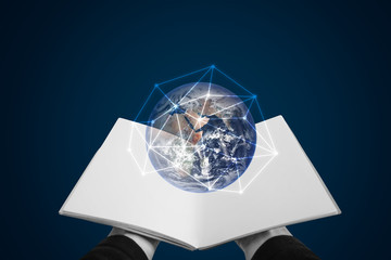 Hand opened book and global with network connection. Knowledge, education, e-booking and e-learning concept. Elements of this image are furnished by NASA