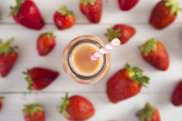 Strawberry Fruit Smoothy on a White Wood Table