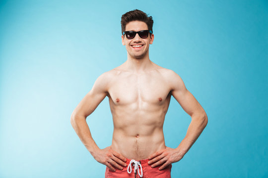 Portrait of a smiling young shirtless man