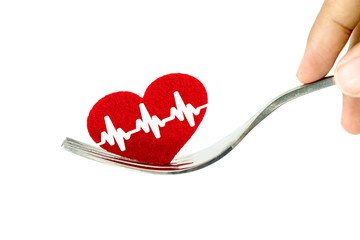 red heart shape in silver fork , health heart care or a healthcare insurance take care concept