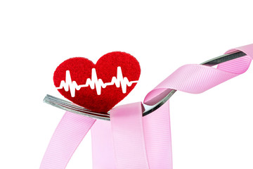 red heart shape in silver fork , health heart care or a healthcare insurance take care concept