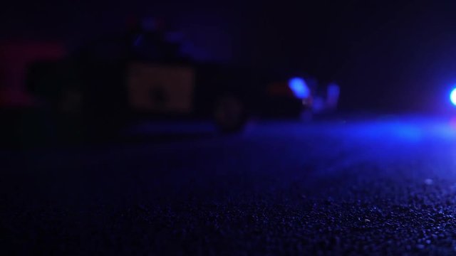 Police Patrol Car at Scene of Emergency (Optical Lens Defocus)