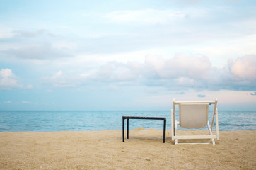 Chair on sand beach.