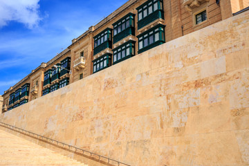 Stone wall and stairs in Valletta, Malta. Empty staircase for background.