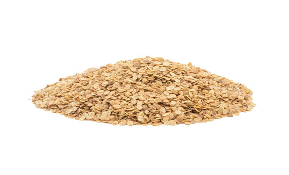 Split Roasted Coriander Seeds also know as Dhana Dal or Sukh Mukh isolated on White Background