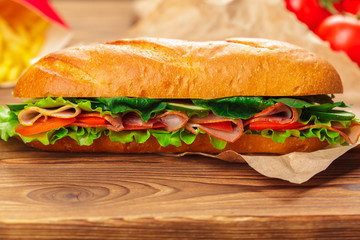 sandwich on a wooden table