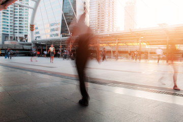 People in city with blur image.