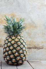 Pineapple on wooden.