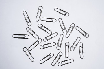 Paper clips on white background.
