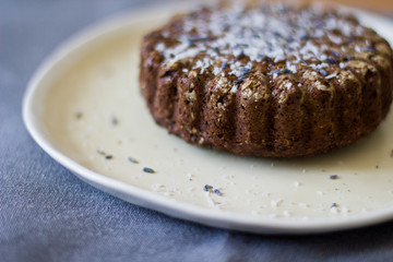 Christmas chocolate tart pie with berries. Raw vegan vegetarian healthy food concept.