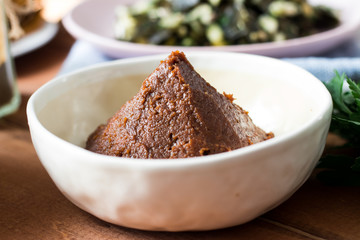 Miso paste made of fermented soy beans with salt. Traditional asian japanese, chinese and korean food. Raw, vegan, vegetarian healthy food concept.