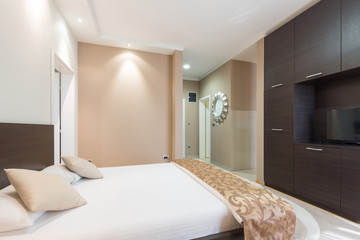Fototapeta na wymiar Interior of a modern luxury hotel bedroom