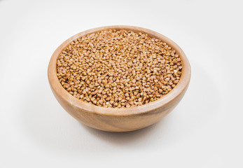 buckwheat in a plate on white background