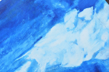 White watercolor smears on a blue canvas.