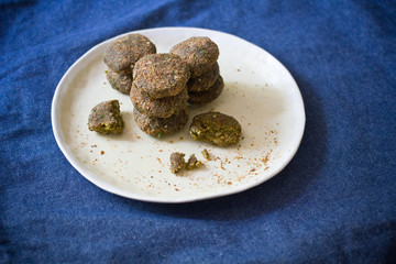 Raw vegan bread with flax seeds, walnuts, sunflower seeds, almonds, herbs and spices. Healthy food.