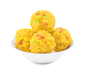 Laddu also know as laddoo, ladoo, laddo are ball-shaped sweets popular in the Indian festivals. Laddu are made of flour, minced dough and sugar with other ingredients. laddu on white background