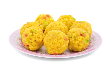 Laddu also know as laddoo, ladoo, laddo are ball-shaped sweets popular in the Indian festivals. Laddu are made of flour, minced dough and sugar with other ingredients. laddu on white background
