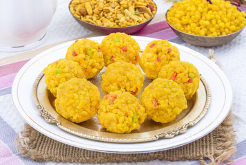 Laddu also know as laddoo, ladoo, laddo are ball-shaped sweets popular in the Indian festivals. Laddu are made of flour, minced dough and sugar with other ingredients