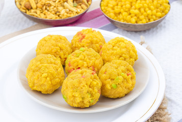 Laddu also know as laddoo, ladoo, laddo are ball-shaped sweets popular in the Indian festivals. Laddu are made of flour, minced dough and sugar with other ingredients