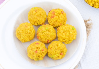 Laddu also know as laddoo, ladoo, laddo are ball-shaped sweets popular in the Indian festivals. Laddu are made of flour, minced dough and sugar with other ingredients
