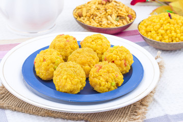 Laddu also know as laddoo, ladoo, laddo are ball-shaped sweets popular in the Indian festivals. Laddu are made of flour, minced dough and sugar with other ingredients