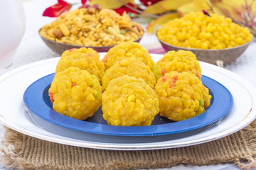 Laddu also know as laddoo, ladoo, laddo are ball-shaped sweets popular in the Indian festivals. Laddu are made of flour, minced dough and sugar with other ingredients