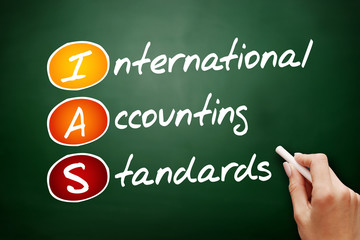 IAS - International Accounting Standards acronym, business concept on blackboard