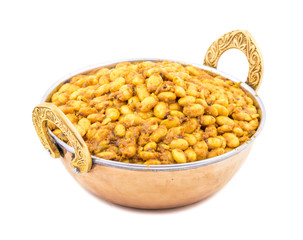 Indian Cuisine Rajma Masala or Rajmah is a South Asian Vegetarian Dish Consisting of White Kidney Beans in a thick gravy with many Indian whole spices and usually served with Chapati and food