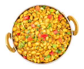 Indian Cuisine Rajma Masala or Rajmah is a South Asian Vegetarian Dish Consisting of White Kidney Beans in a thick gravy with many Indian whole spices and usually served with Chapati and food