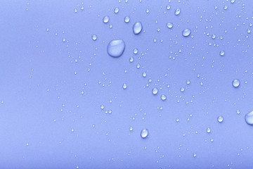Drops of water on a color background. Gray. Toned