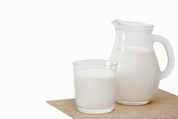 Obraz na płótnie Canvas Jug of milk and glass milk