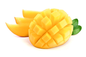 Mango fruit half with leaves and slices isolated on white background close-up